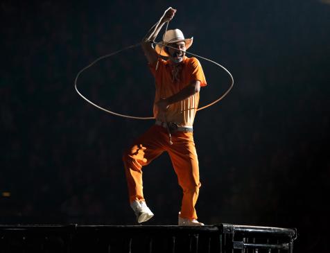 A rodeo clown shows off their skills at the PBR event at Scotiabank Centre.